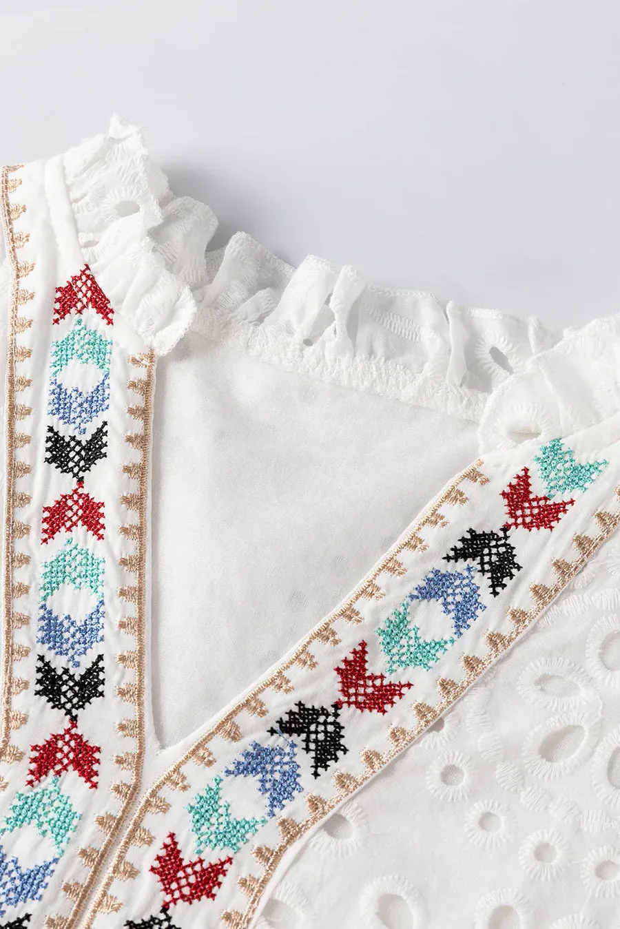 Blouse with v-neck, relaxed fit and elegant details for women