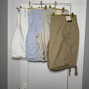 Bundle of four St. John’s Bay Bermuda style shorts size 24W Petite NEW