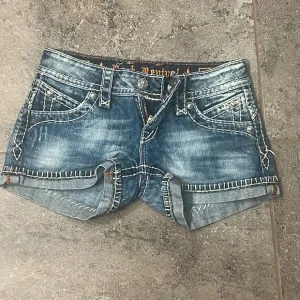 Light wash rock revival Jean shorts