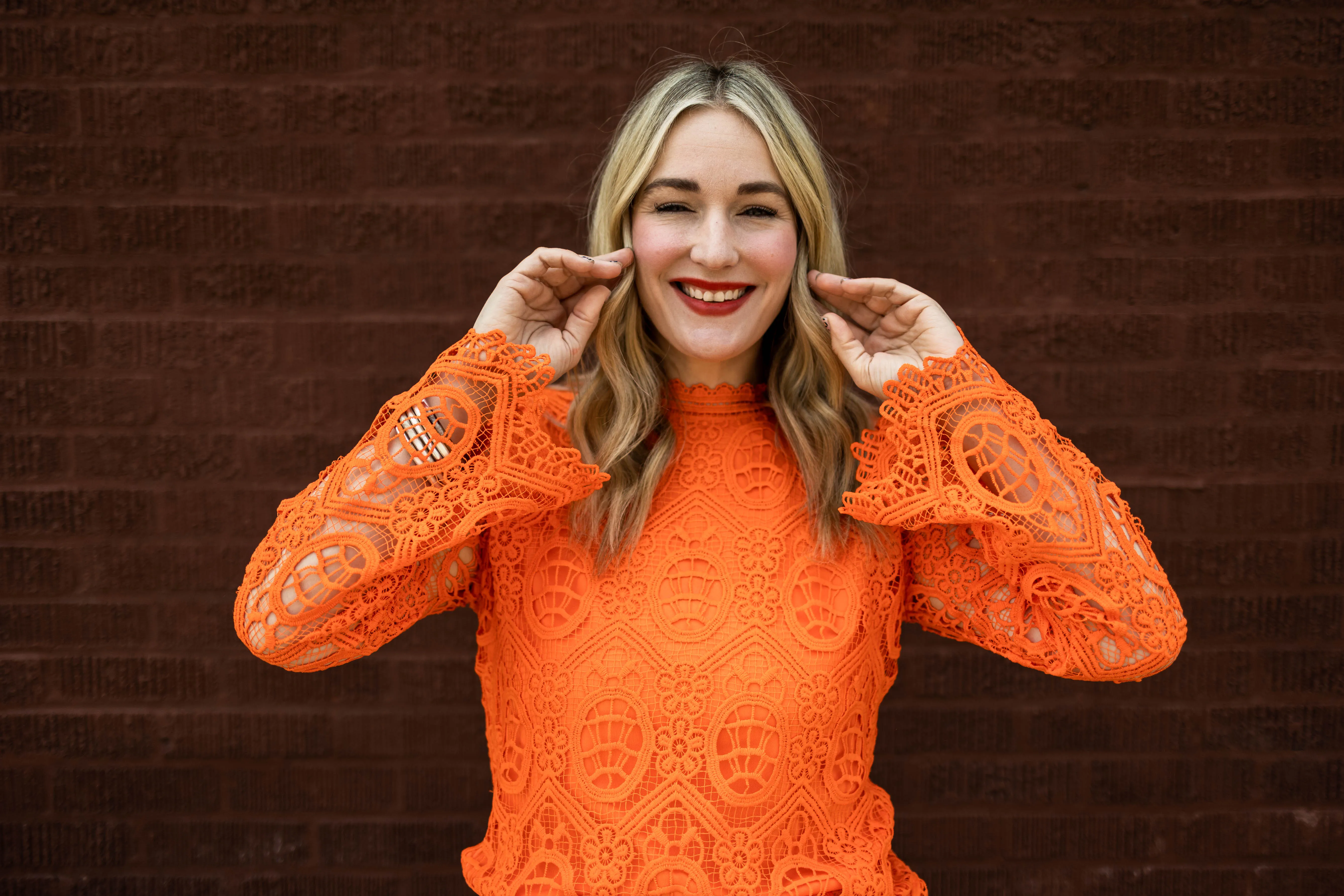 oriane long sleeve lace top in orange