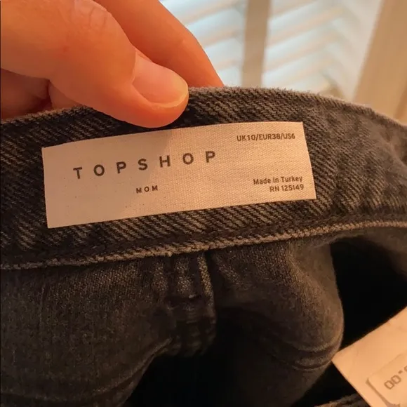 Topshop Distressed Hi-Rise Shorts in Washed Black